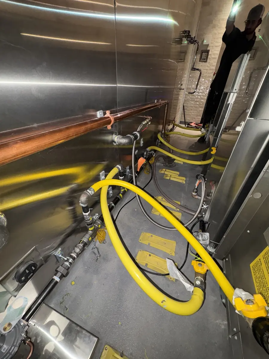 Gas manifold installation serving two commercial kitchens