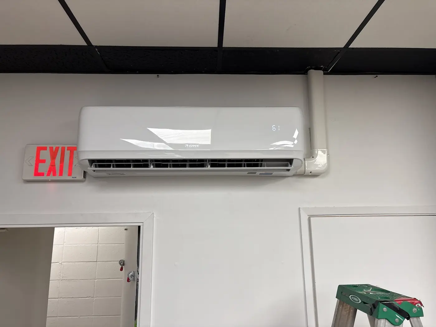 Wall-mounted ductless mini-split installed indoors